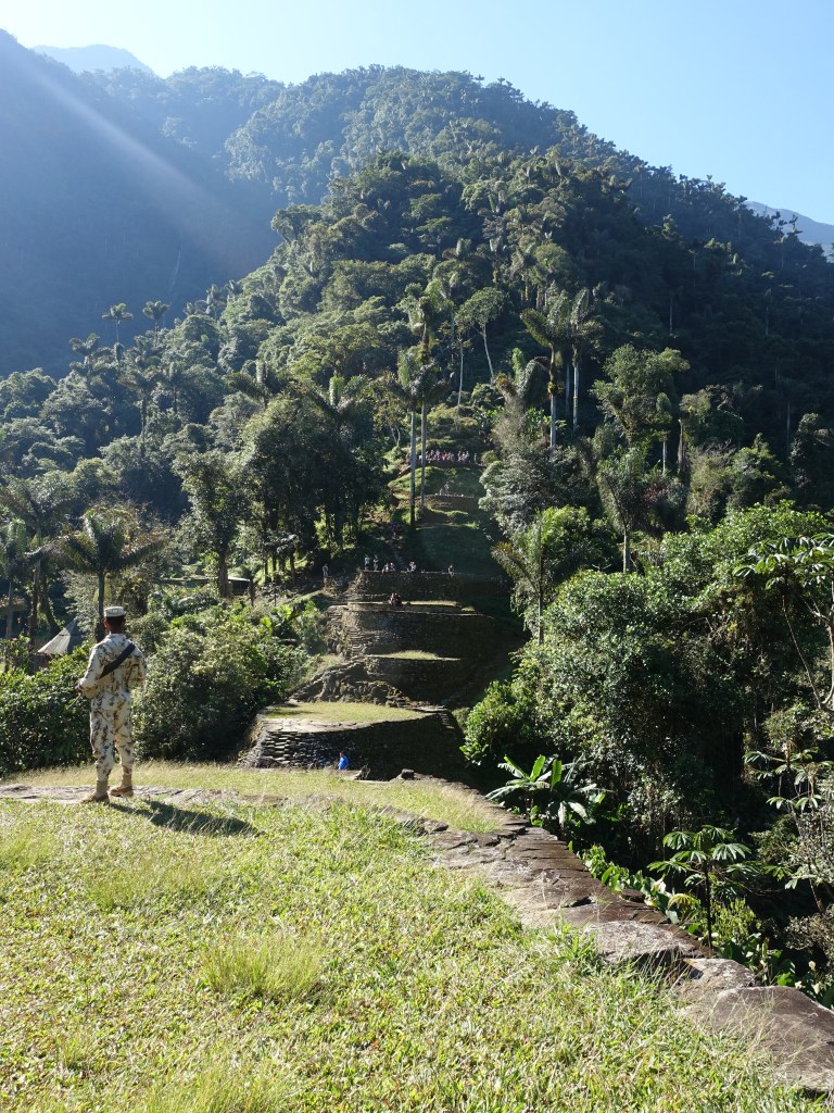 A Colombian Army man stands guard at sunrise at the Lost City